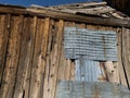 Old Deteriorating Wood and Corrugated Steel Background