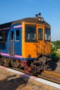 The old diesel multiple unit of the local train is waiting for departure from the station Royalty Free Stock Photo