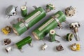 Old different fixed, variable and adjustable resistors on a gray surface Royalty Free Stock Photo