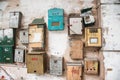 Old different mailboxs on the old wall Royalty Free Stock Photo