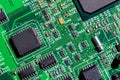 old digital circuit board with microprocessors and components, closeup full-frame macro background Royalty Free Stock Photo