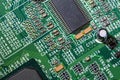 old digital circuit board with microprocessors and components, closeup full-frame macro background Royalty Free Stock Photo