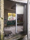 Old dilapidated, abandoned, squatted and tagged building