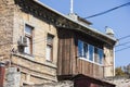 Old dilapidated balcony in an old residential building, closeup Royalty Free Stock Photo