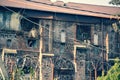 Old dilapidated brick building. architectural cultural heritage monument. abandoned stone house without windows and roof