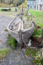 Old dilapidated fishing boat on the shore