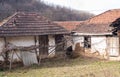 Old dilapidated houses in an abandoned mountain Serbian village in southeastern Serbia, on the slopes of Suva Planina mountain Royalty Free Stock Photo