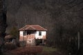 Old dilapidated houses in an abandoned mountain Serbian village in southeastern Serbia, on the slopes of Suva Planina mountain Royalty Free Stock Photo