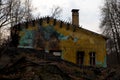 Old dilapidated and partially burnt house.