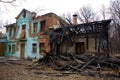 Old dilapidated and partially burnt house.