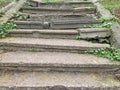 an old dilapidated stone staircase to the top overgrown with grass Royalty Free Stock Photo