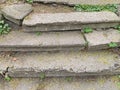 an old dilapidated stone staircase to the top overgrown with grass Royalty Free Stock Photo