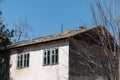 Old dilapidated, weather-beaten house that needs to be renovated. Housing problem