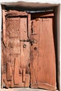 Old dilapidated wooden door.