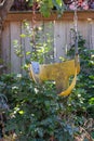 Old dilapidated yellow swing