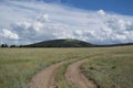 Old dirt road on the Wyoming prairie Royalty Free Stock Photo