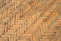 Old dirty beige tile lined with a geometric pattern. Stone texture. Paving slabs at Durbar Square in Kathmandu, Nepal