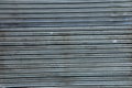 Old dirty corrugated metal sheet of slide door Royalty Free Stock Photo