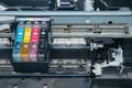 Old, dirty, disassembled ink jet printer. View of internal parts.