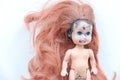 old dirty doll stained with paint Royalty Free Stock Photo