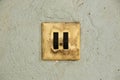 Old dirty double switch on old wall in workshop Royalty Free Stock Photo