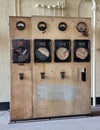 Old dirty industrial control panel of measuring gauges