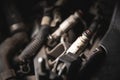 Old dirty injectors on the fuel rail in selective focus Royalty Free Stock Photo