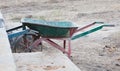 Old dirty metal wheelbarrow Royalty Free Stock Photo