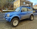 Old dirty off road rally car Suzuki Jimny 4WD