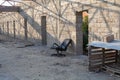 Old dirty office with empty black chair and brick wall background Royalty Free Stock Photo