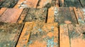 Old dirty orange roof tiles