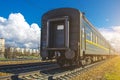 Old dirty Passenger Train Cars on station in Russia. Royalty Free Stock Photo