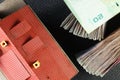 Old and dirty plastic house model put beside banknote. Royalty Free Stock Photo