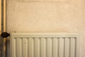 Old dirty radiator in a vintage antique home Royalty Free Stock Photo
