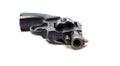 Old dirty revolver gun isolated over white Royalty Free Stock Photo