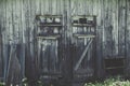 Old dirty rustic grunge farm country house or shed locked doors