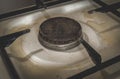 Old dirty rusty gas stove burner Royalty Free Stock Photo