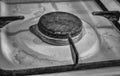 Old dirty rusty switch off gas stove burner. Royalty Free Stock Photo