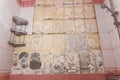 old dirty shabby bathroom with fallen tiles. old shelf. shower stand Royalty Free Stock Photo