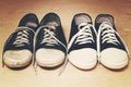 Old dirty shabby and new clean unworn sneakers Royalty Free Stock Photo
