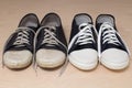 Old dirty shabby and new clean unworn sneakers Royalty Free Stock Photo