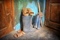 Old dirty shoes in village hallway Royalty Free Stock Photo