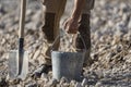 Old dirty shovel stuck in the ground on the garden Royalty Free Stock Photo