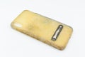 Old and dirty silicon phone case due to yellow stains and mold Royalty Free Stock Photo