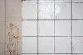 Old dirty tiles white wall