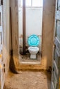 Old dirty toilet in abandoned warehouse Royalty Free Stock Photo