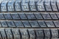 Old and Dirty Used Car Tires Texture. Close Up stacks of old Tires. Royalty Free Stock Photo