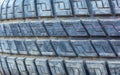 Old and Dirty Used Car Tires Texture. Close Up stacks of old Tires. Royalty Free Stock Photo