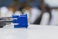 Old dirty VGA tech cable connector of computer on table white Blur meeting room background Royalty Free Stock Photo