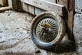 An old dirty wheel from a children's bike. Royalty Free Stock Photo